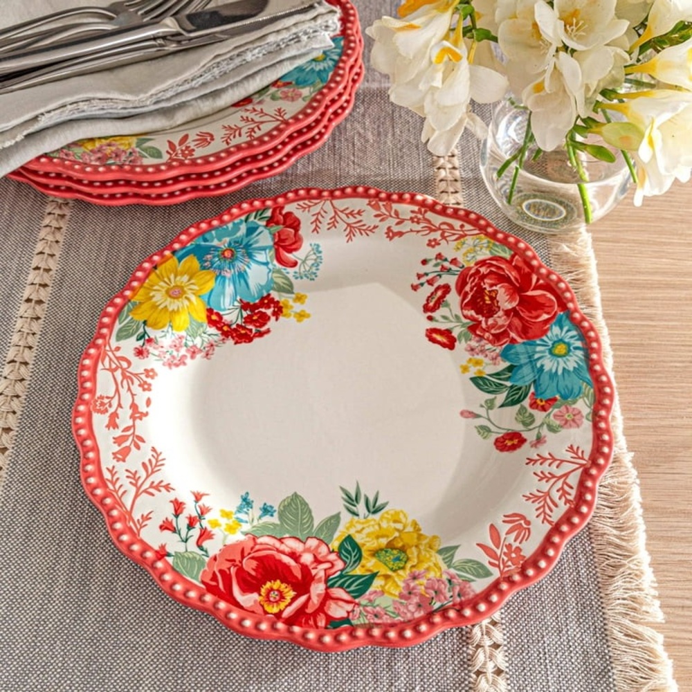 Two Pioneer Woman fancy flourish plates